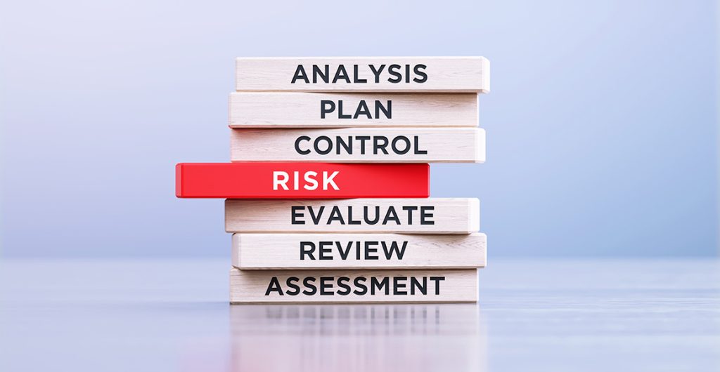 Tower made of wooden blocks, symbolic image for robot safety.