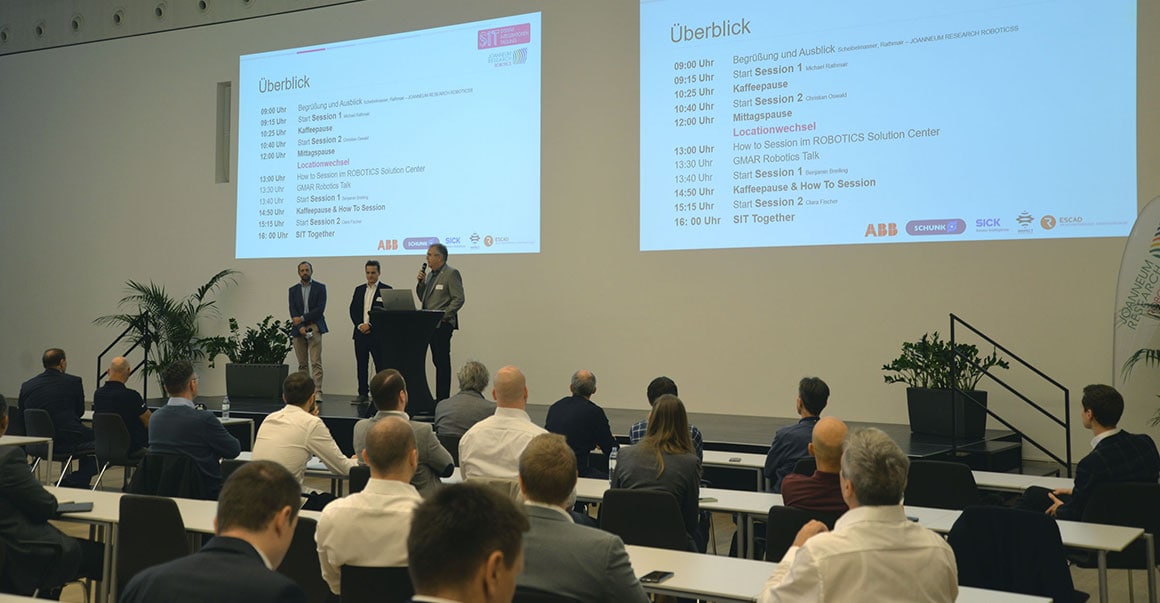 Eröffnung der SIT durch Institutsdirektor Scheibelmasser und Stellvertreter Rathmair auf der Bühne